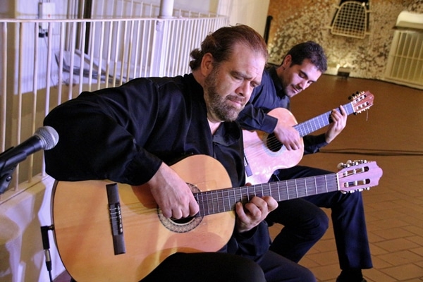 two male guitar players