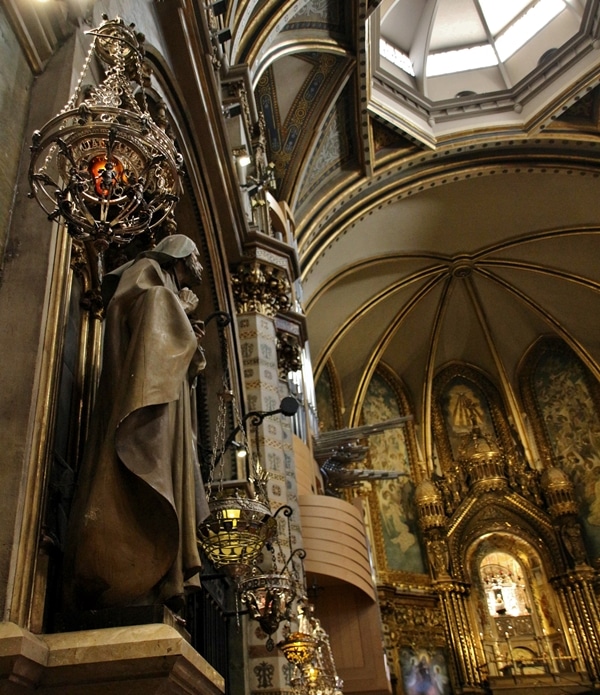 sculptures and lighting fixtures in a church