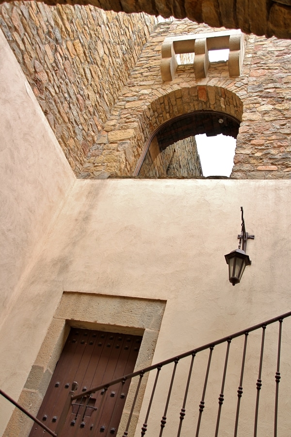 open air stairwell of an old stone building