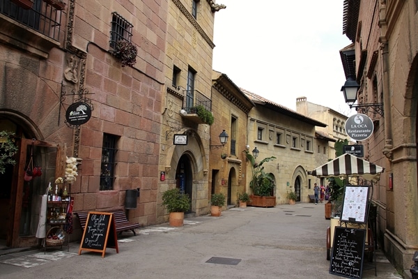 A close up of quaint street with shops