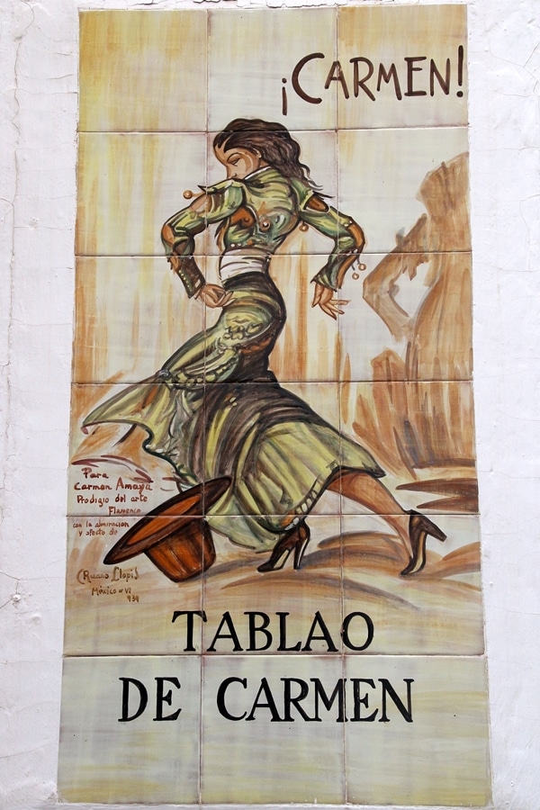 a drawing of a flamenco dancer with a sign that says Tablao