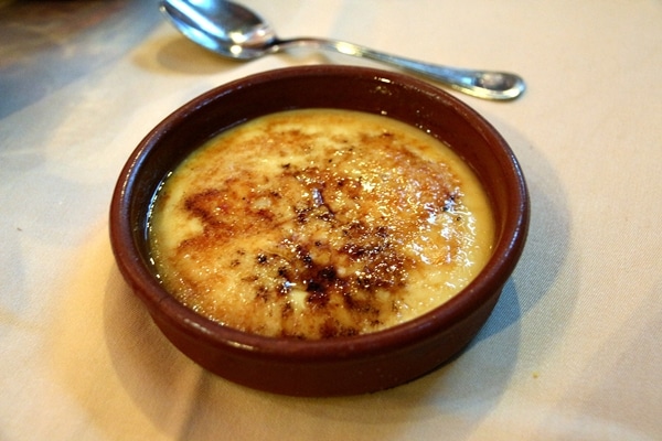 Catalan custard served in a round brown dish