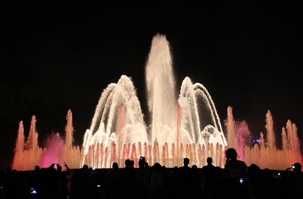 a colorful water fountain at night