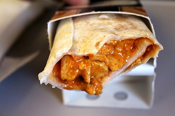 a Chicken Tikka Wrap with a couple bites taken out