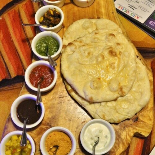 Bread service from Sanaa at Disney World, served with a variety of dipping sauces