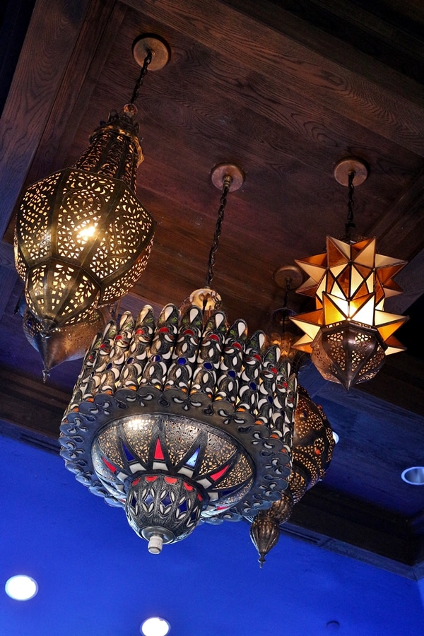 intricately decorated lighting fixtures in a restaurant