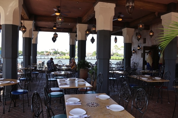 a restaurant dining room overlooking a lagoon