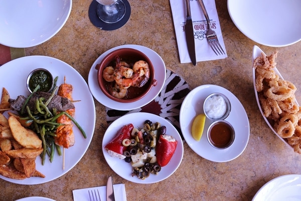 overhead view of plates of food on a table