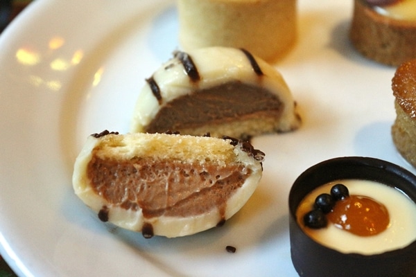 cross-section of a Zebra Dome dessert on a white plate