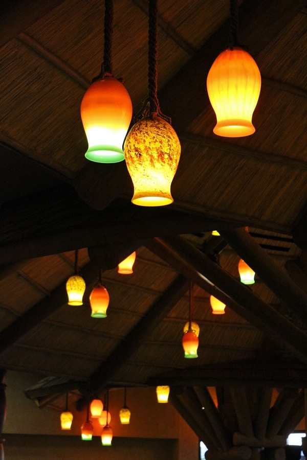 colorful lighting fixtures hanging from the ceiling