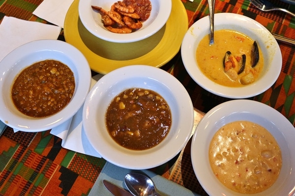 several bowls of food on a table