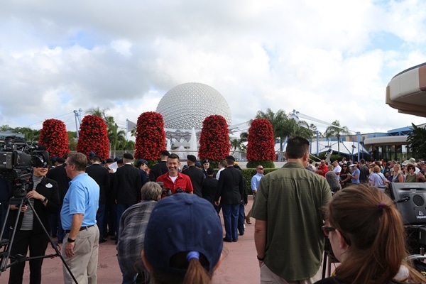 A group of people standing in a crowd