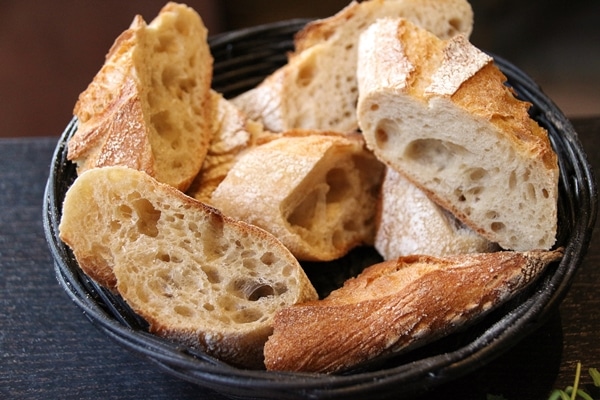 a basket of sliced French bread