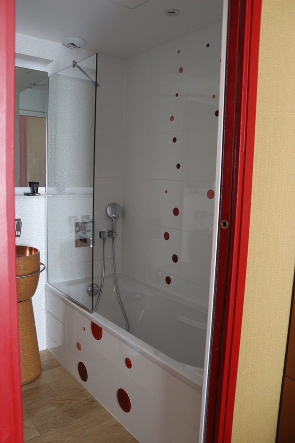 A shower in a hotel bathroom