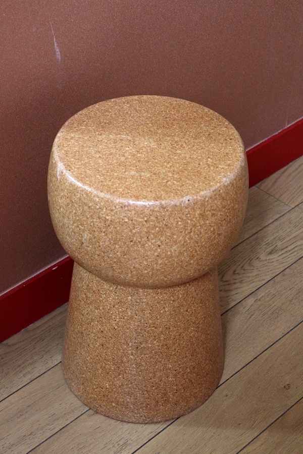 a chair that resembles a Champagne cork