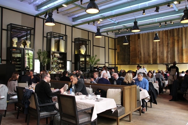 A group of people sitting in a restaurant