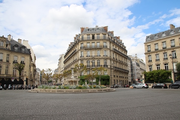 a large elegant square with fancy buildings