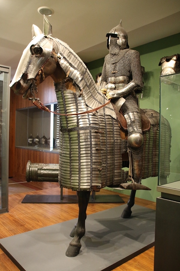 a suit of armor on top of an armored horse