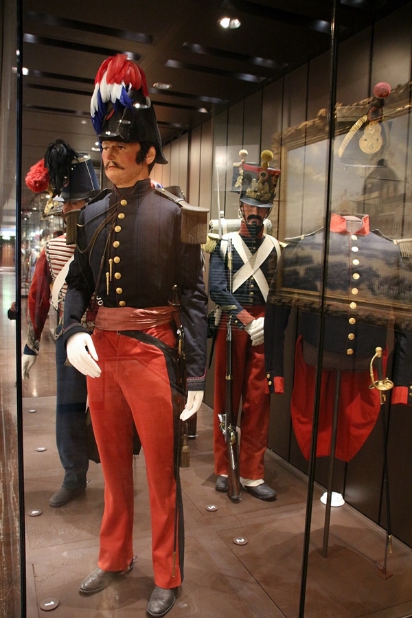 French military uniforms in a museum display