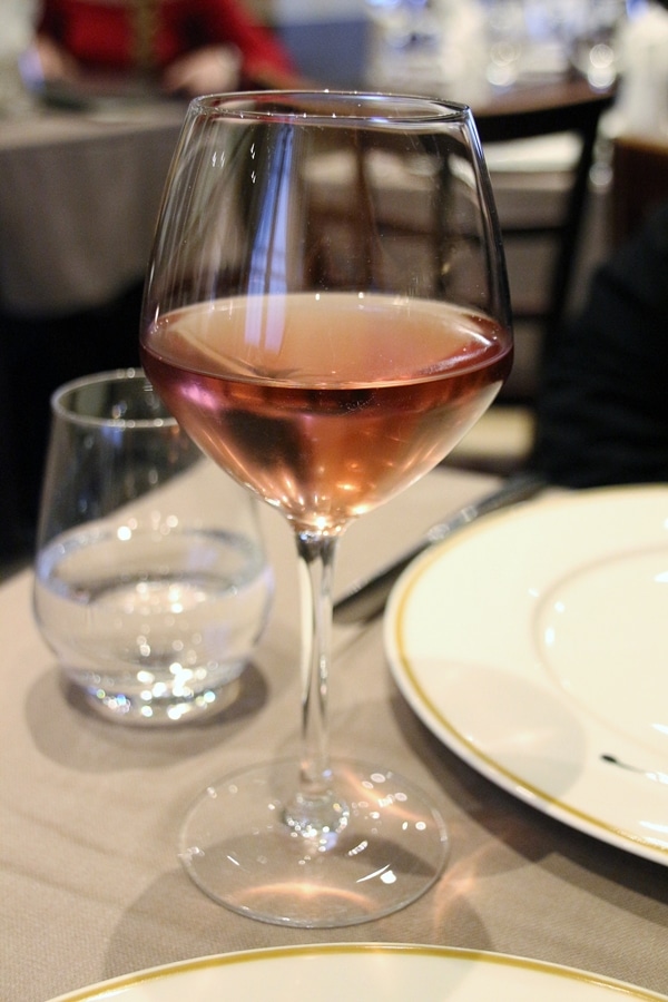 a glass of rose wine