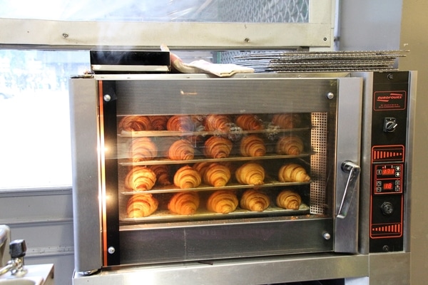 croissants baking in an oven