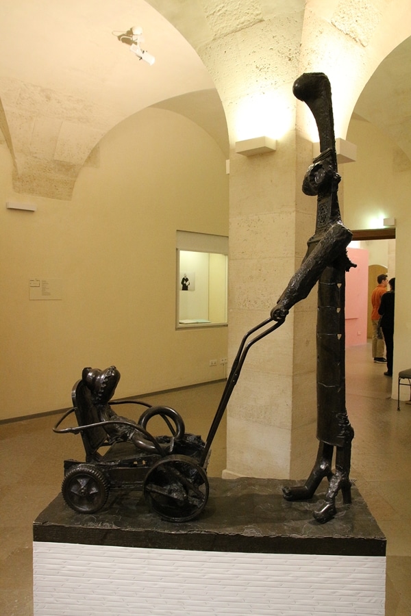 side view of a Picasso statue in a museum