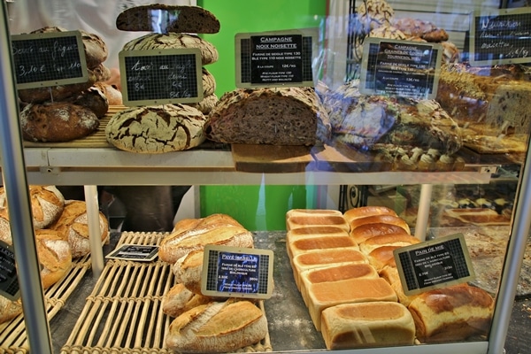 a display case of various breads