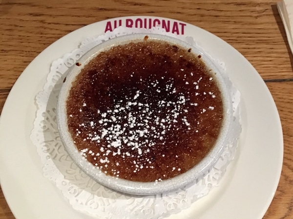 creme brulee in a white dish