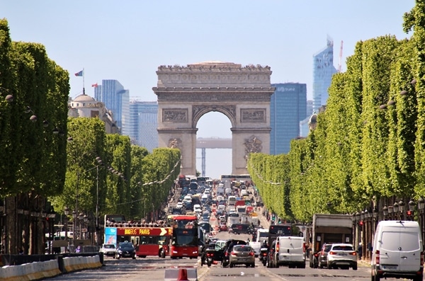 a view down the Champs-Élysées of the Arc de Triomphe in the distance