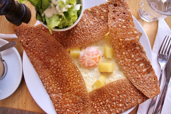 overhead view of a crepe with potatoes and egg