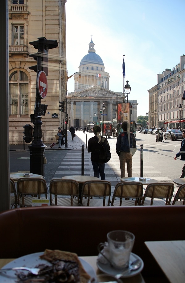 view of people and a street outside a restaurant window