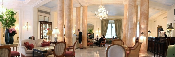 interior of a fancy hotel lounge with crystal chandeliers