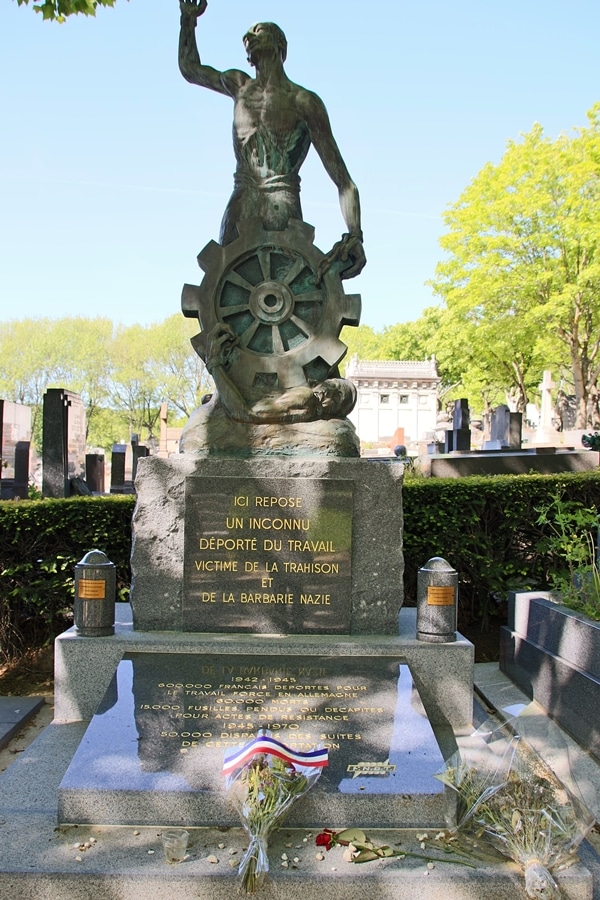 a large monument in a cemetery