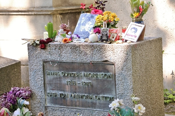 a closeup of Jim Morrison\'s gravestone