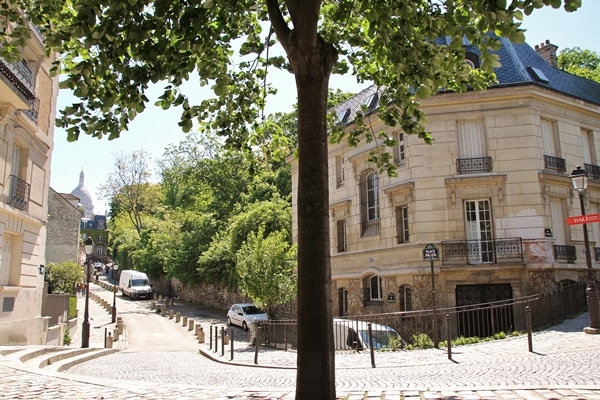 a quiet cobblestone Parisian street