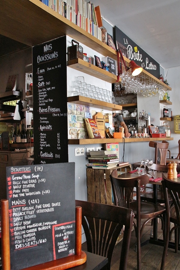 the interior of a small Parisian restaurant