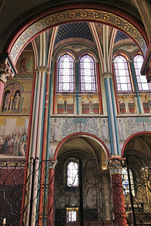 frescoes on church walls with tall windows