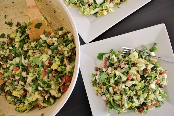 Hollywood Brown Derby Salad tossed and served on 2 square plates