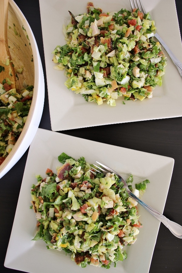 Hollywood Brown Derby Salad tossed and served on 2 square plates