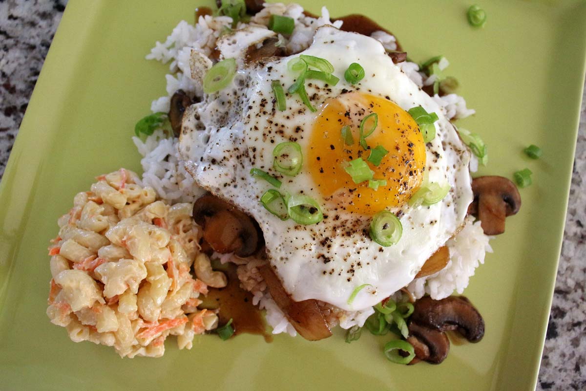 Loco Moco (white rice, burger patty, gravy, and fried egg) with scoop of macaroni salad