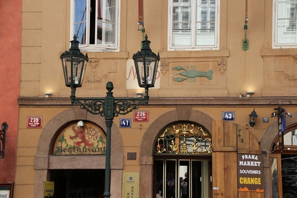 an image of a green lobster on the side of a building