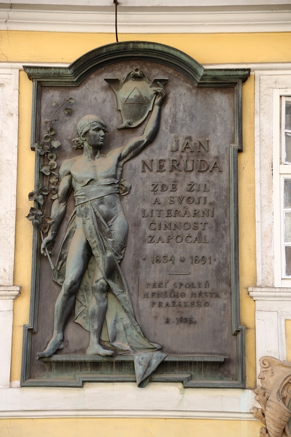 closeup of a metal plaque on a building