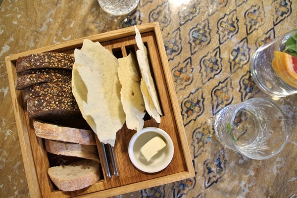 a bread board on an ornate table top