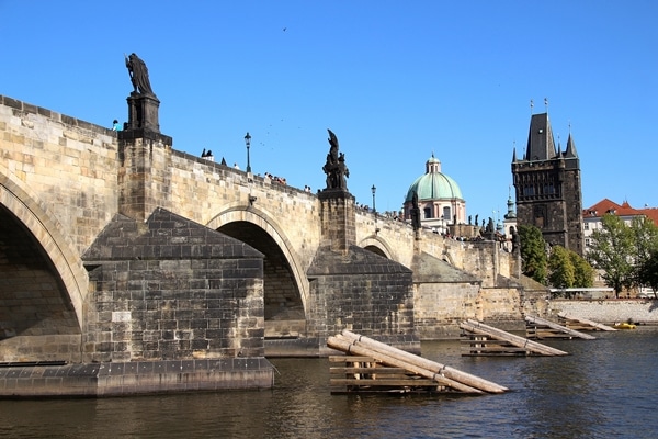 A stone bridge over a body of water