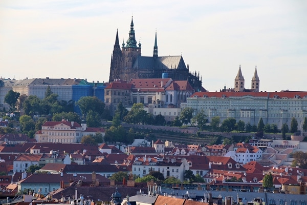 A view of Prague Castle with large buildings around it