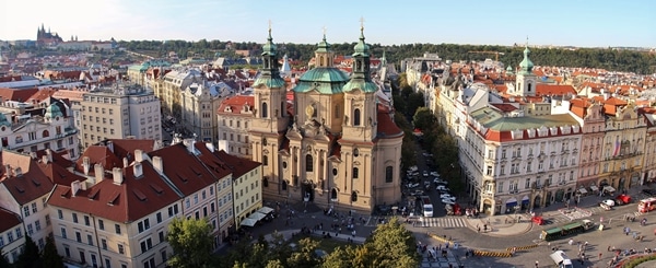 a massive church with green domes