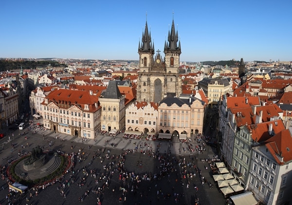 view of a large open city square from a tall clock tower