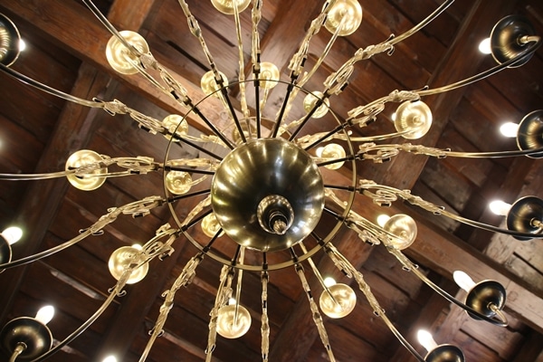 a gold chandelier viewed from below