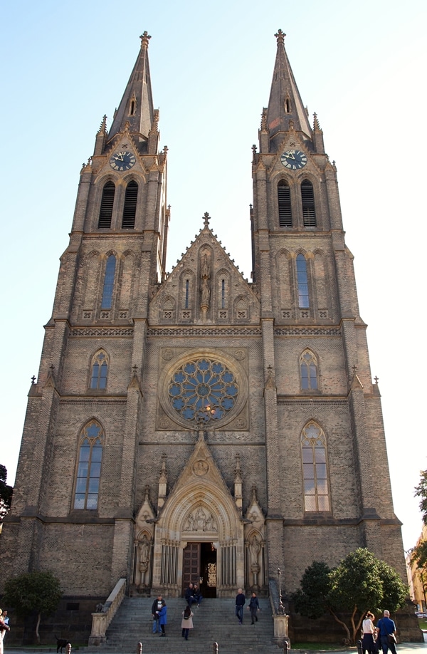 A church with large window on the front of a building