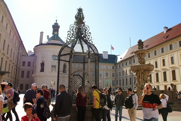 a small city square filled with people